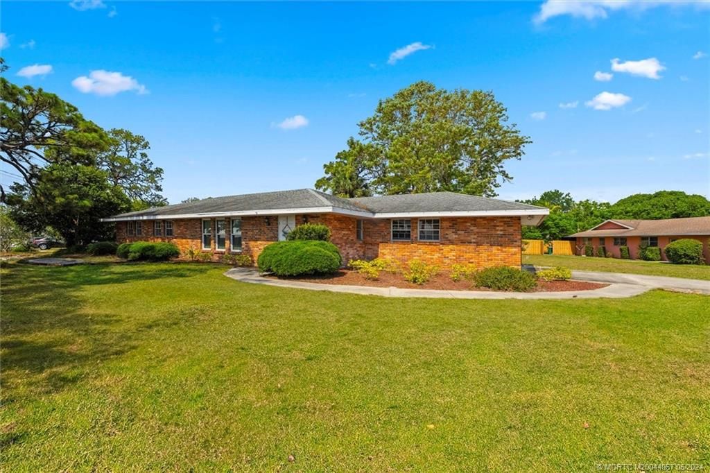 Photo of 101 NE Caprona Avenue, Port Saint Lucie, FL 34983 (MLS # M20044957)