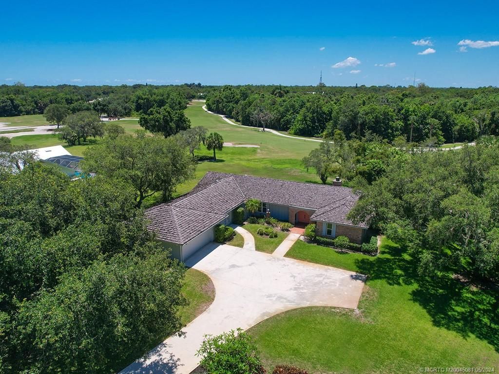 Photo of 1644 SW Saint Andrews Drive, Palm City, FL 34990 (MLS # M20045081)