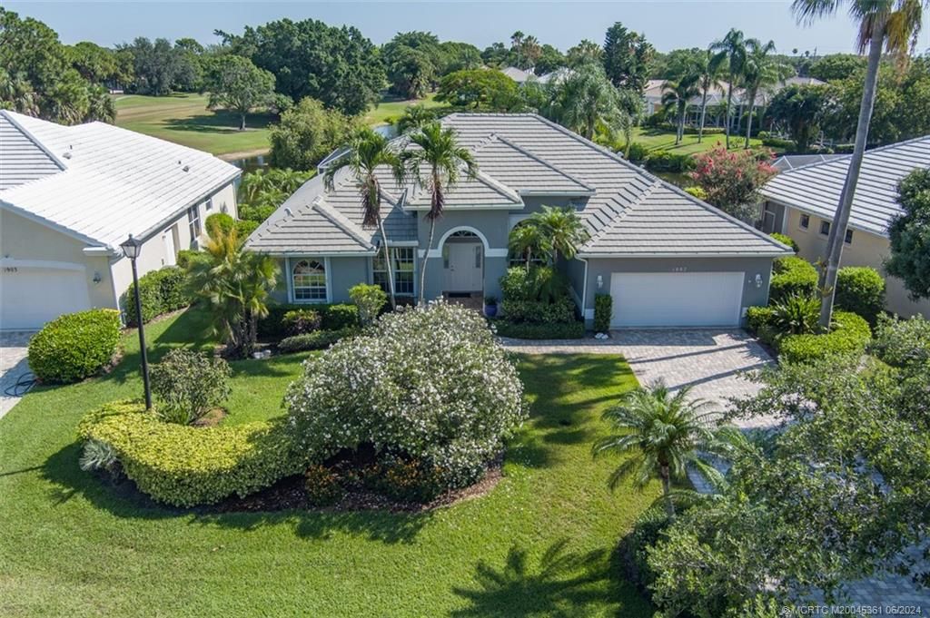 Photo of 1887 SW Whitemarsh Way, Palm City, FL 34990 (MLS # M20045361)