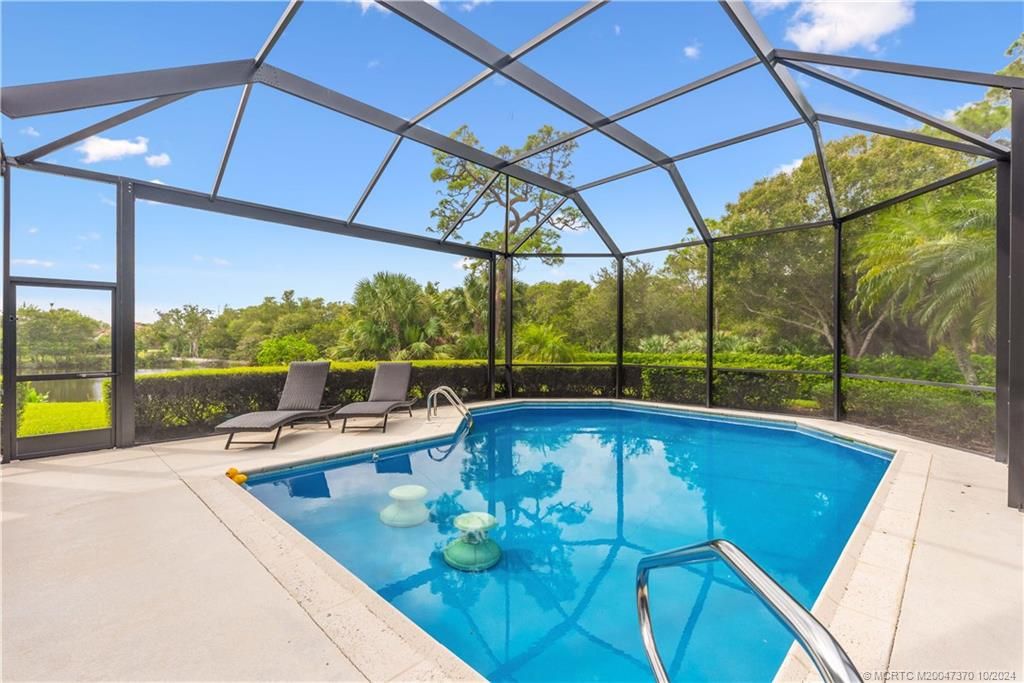 Photo of 12326 Harbour Ridge Boulevard, Palm City, FL 34990 (MLS # M20047370)