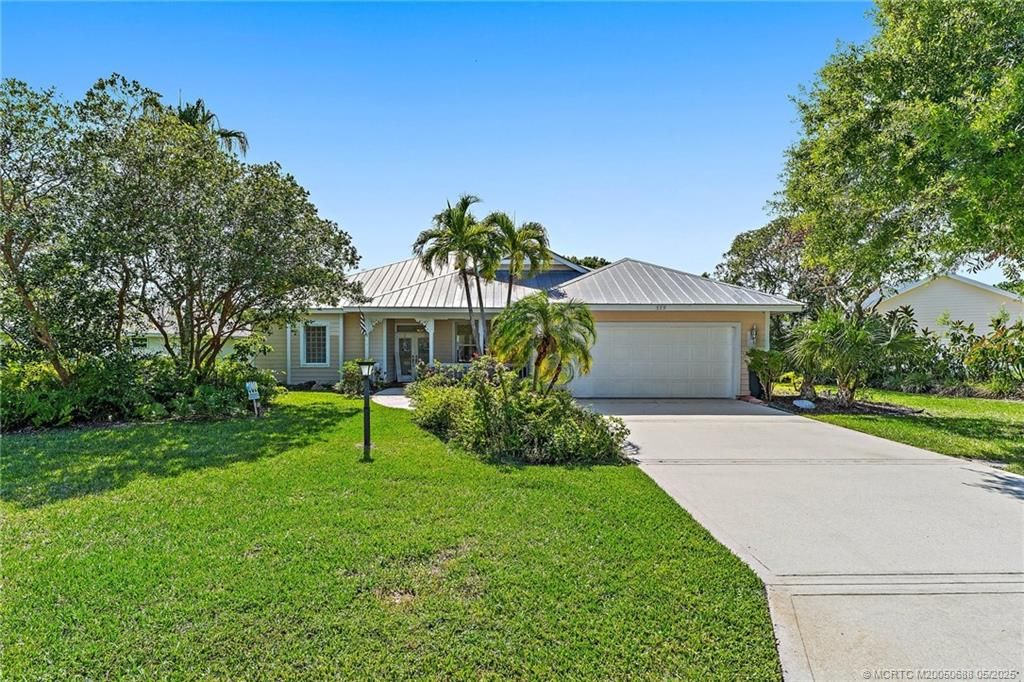 Photo of 579 SE Meadow Wood Way, Stuart, FL 34997 (MLS # M20050688)