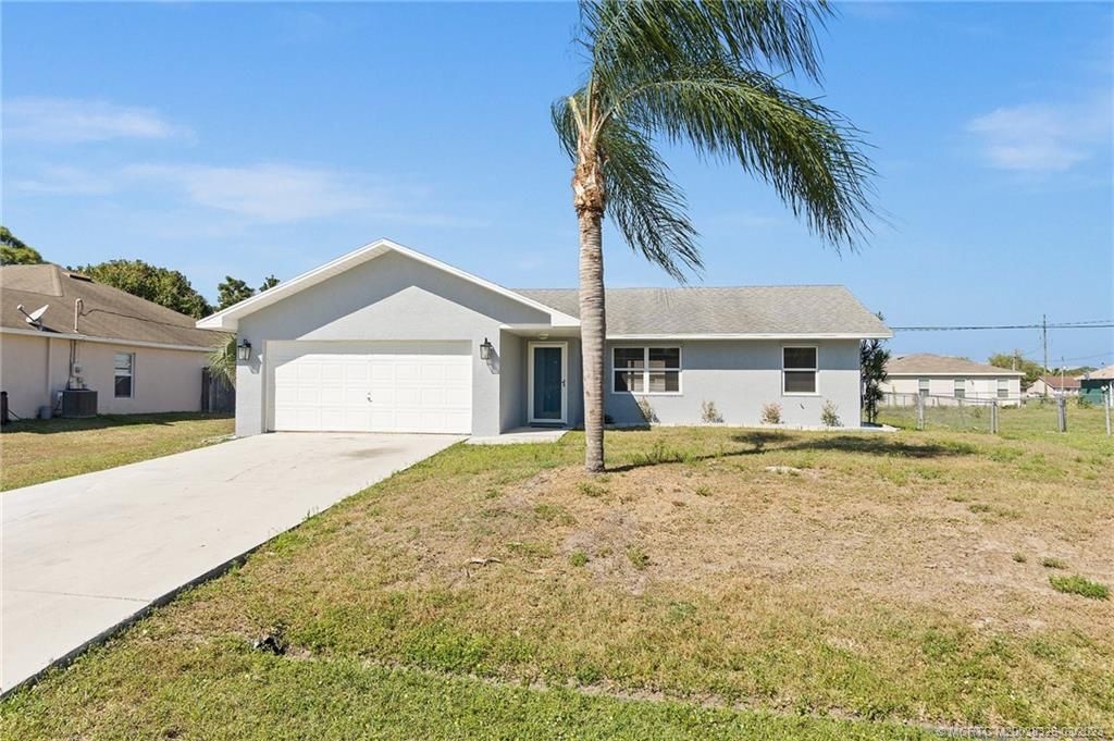 Photo of 335 NW Fairfax Avenue, Port Saint Lucie, FL 34983 (MLS # M20038326)
