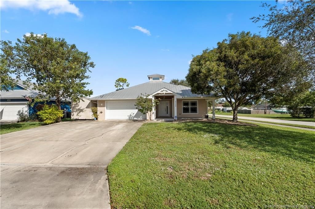 Photo of 5029 SE Jack Avenue, Stuart, FL 34997 (MLS # M20050837)