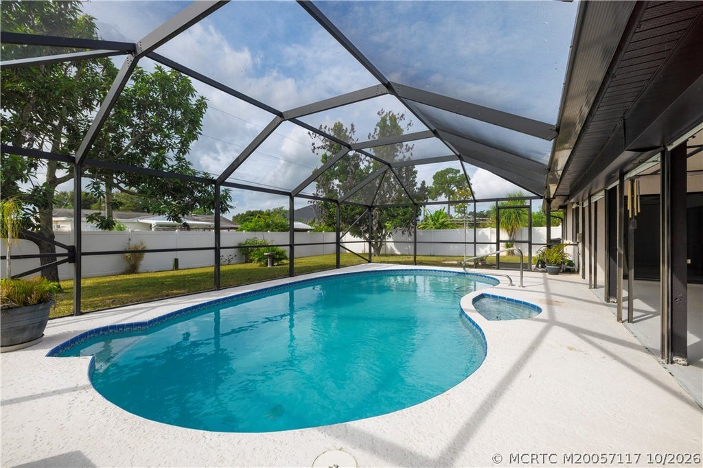 Photo of 160 SE Duxbury Avenue, Port Saint Lucie, FL 34983 (MLS # M20057117)