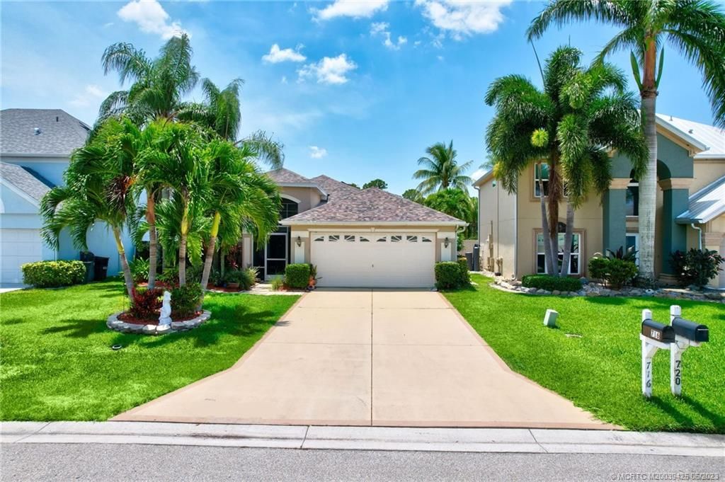 Photo of 716 NW Waterlily Place, Jensen Beach, FL 34957 (MLS # M20039425)