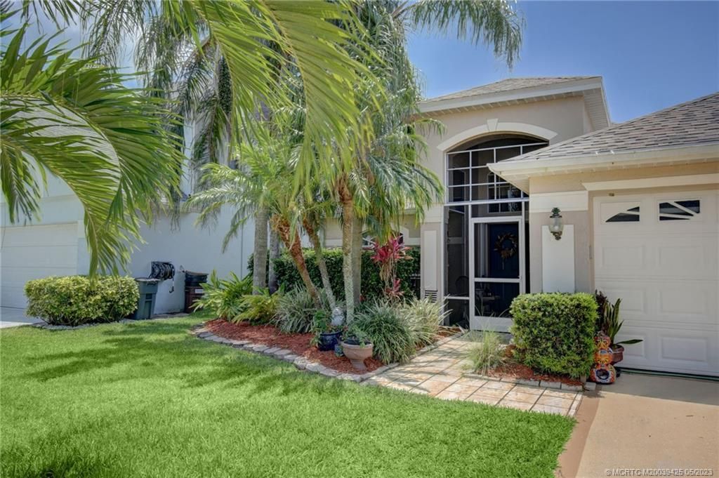 Photo of 716 NW Waterlily Place, Jensen Beach, FL 34957 (MLS # M20039425)