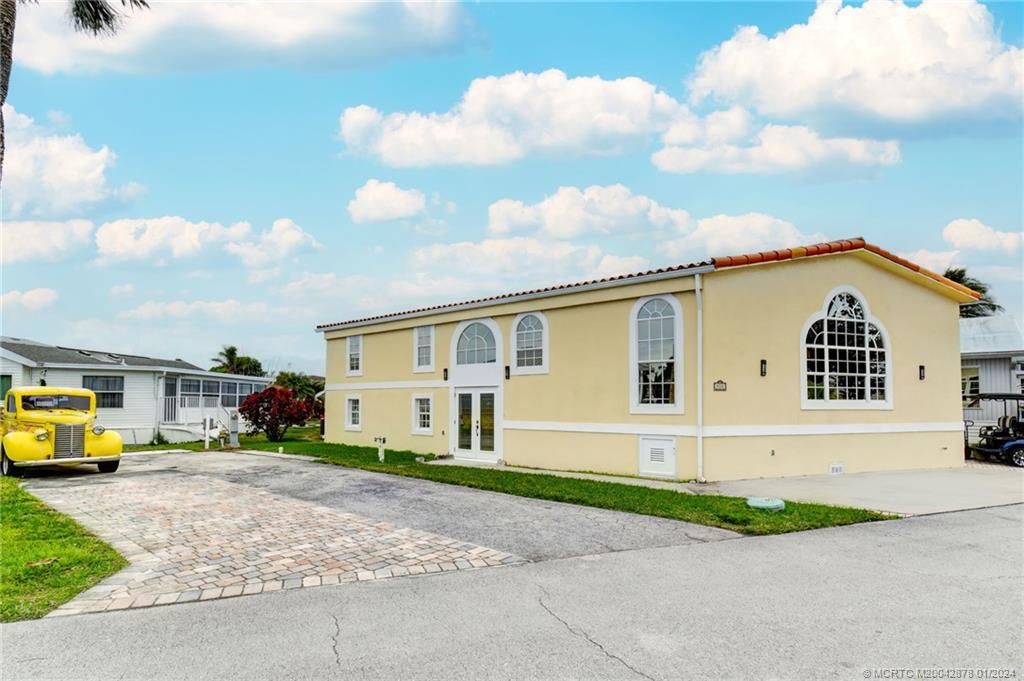 Photo of 955 Nettles Boulevard, Jensen Beach, FL 34957 (MLS # M20042878)