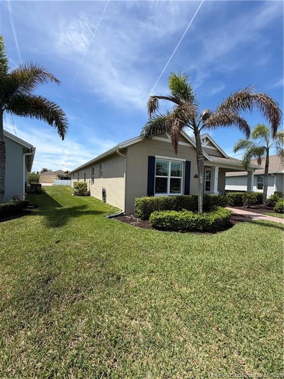 Photo of 10395 SW Landry Lane SW, Port Saint Lucie, FL 34987 (MLS # M20055639)