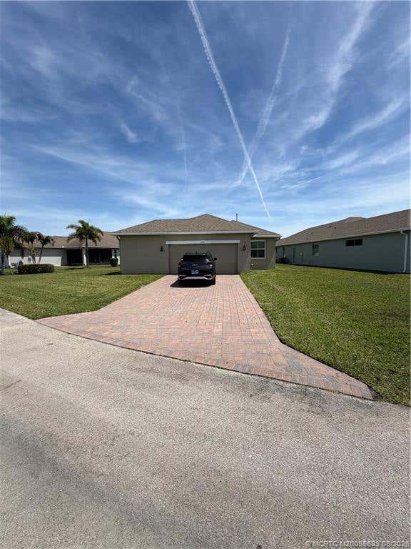 Photo of 10395 SW Landry Lane SW, Port Saint Lucie, FL 34987 (MLS # M20055639)