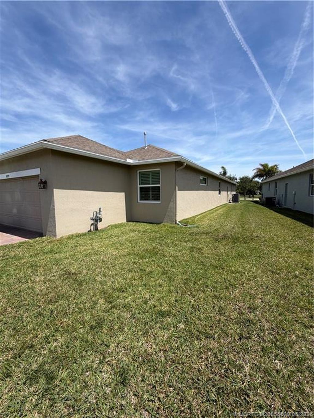 Photo of 10395 SW Landry Lane SW, Port Saint Lucie, FL 34987 (MLS # M20055639)