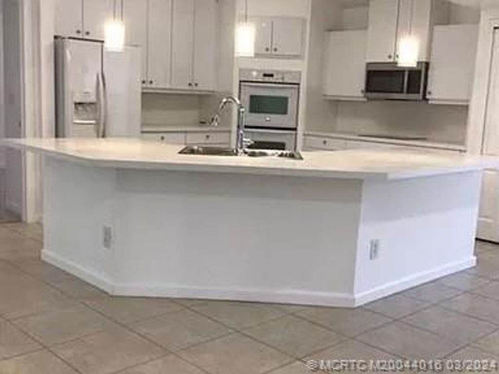 Photo of 5310 NW Mayfield Lane, Port Saint Lucie, FL 34983 (MLS # M20044016)