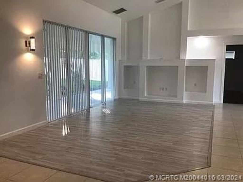 Photo of 5310 NW Mayfield Lane, Port Saint Lucie, FL 34983 (MLS # M20044016)