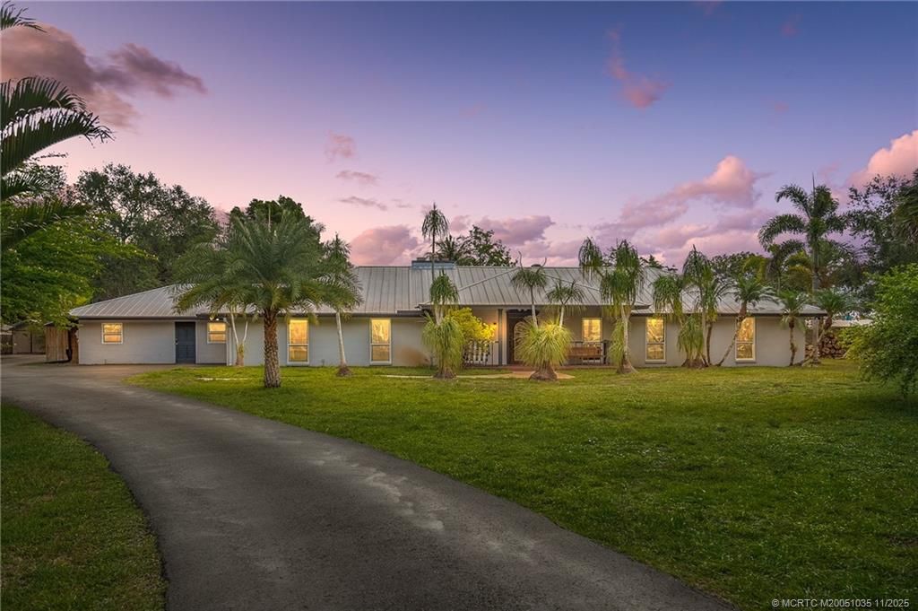 Photo of 4800 SW Woodham Street, Palm City, FL 34990 (MLS # M20051035)