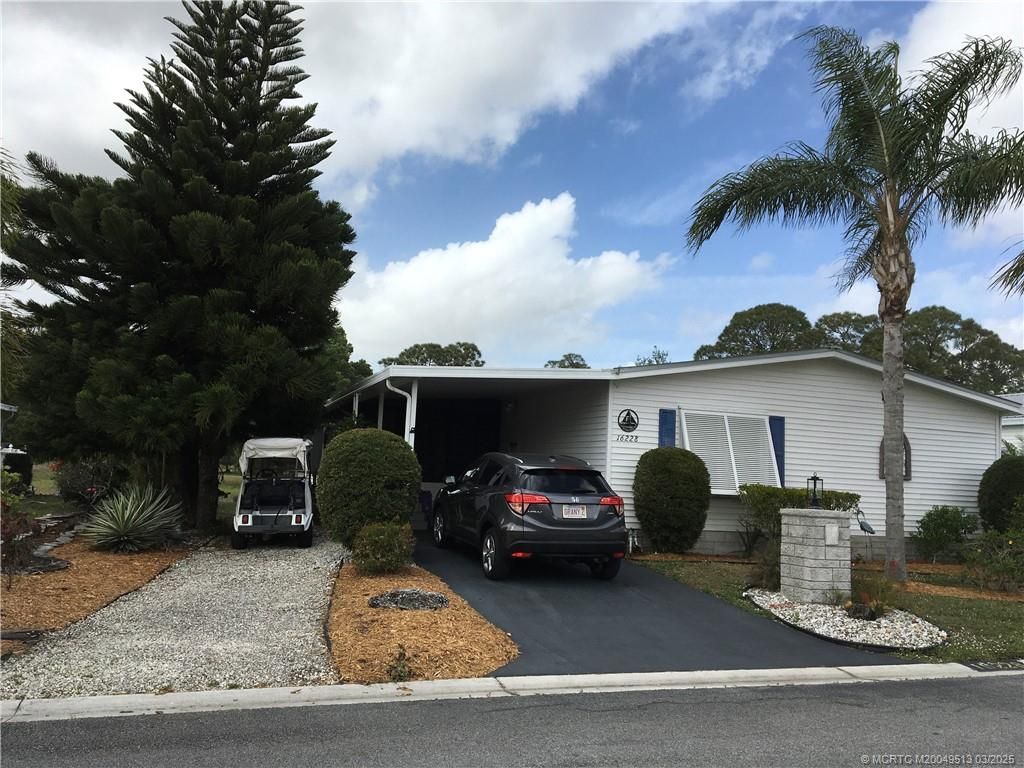 Photo of 16228 SW Indianwood Cir Cir, Indiantown, FL 34956 (MLS # M20049513)