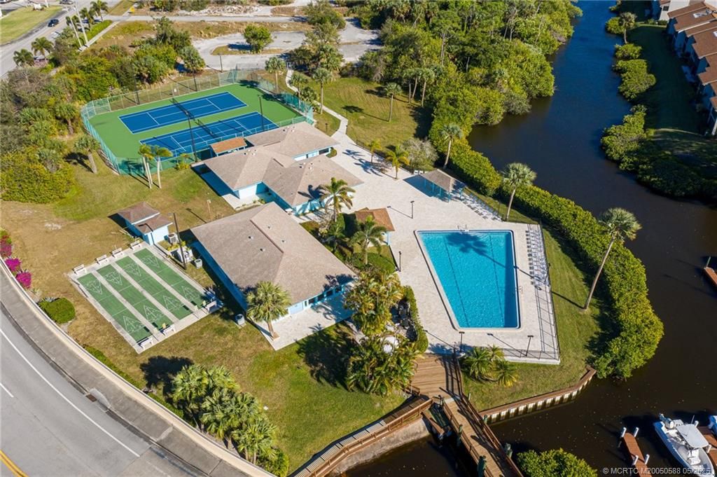 Photo of 1585 NE Beacon Drive NE #1107, Jensen Beach, FL 34957 (MLS # M20050588)