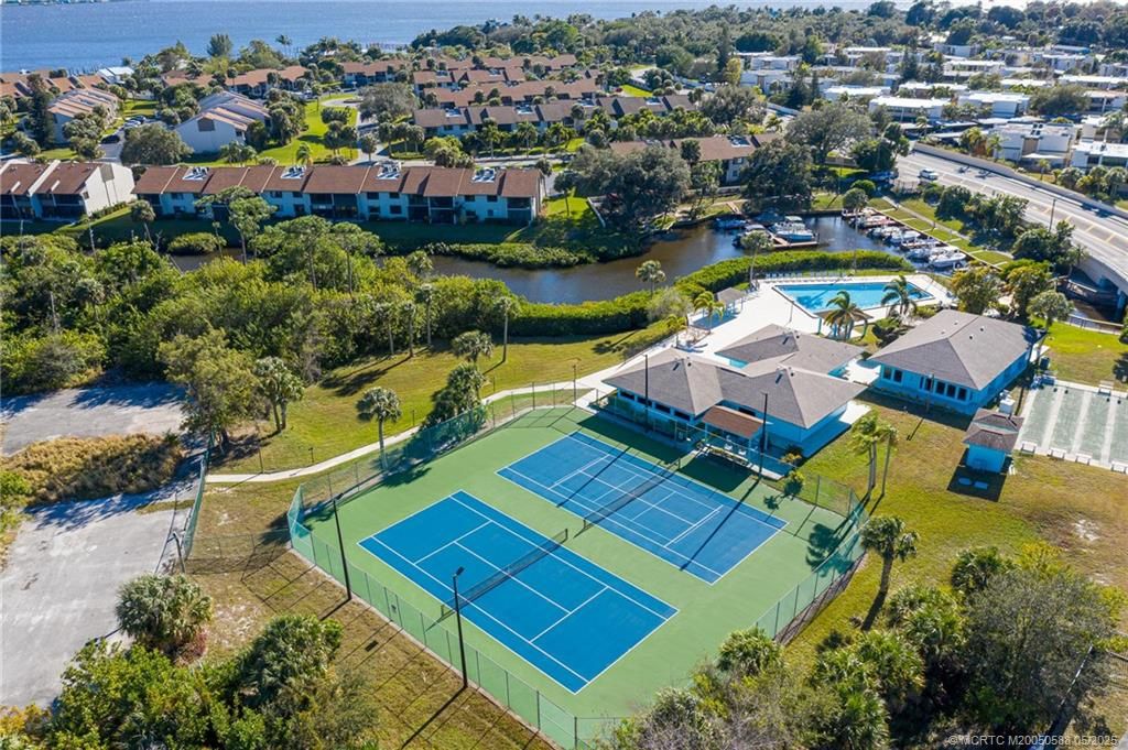 Photo of 1585 NE Beacon Drive NE #1107, Jensen Beach, FL 34957 (MLS # M20050588)