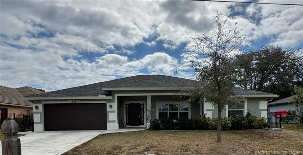 Photo of 842 NW Treemont Avenue, Port Saint Lucie, FL 34983 (MLS # M20054205)