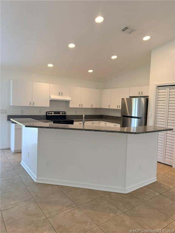 Photo of 2249 SE Friendship Lane #0, Port Saint Lucie, FL 34952 (MLS # M20056225)