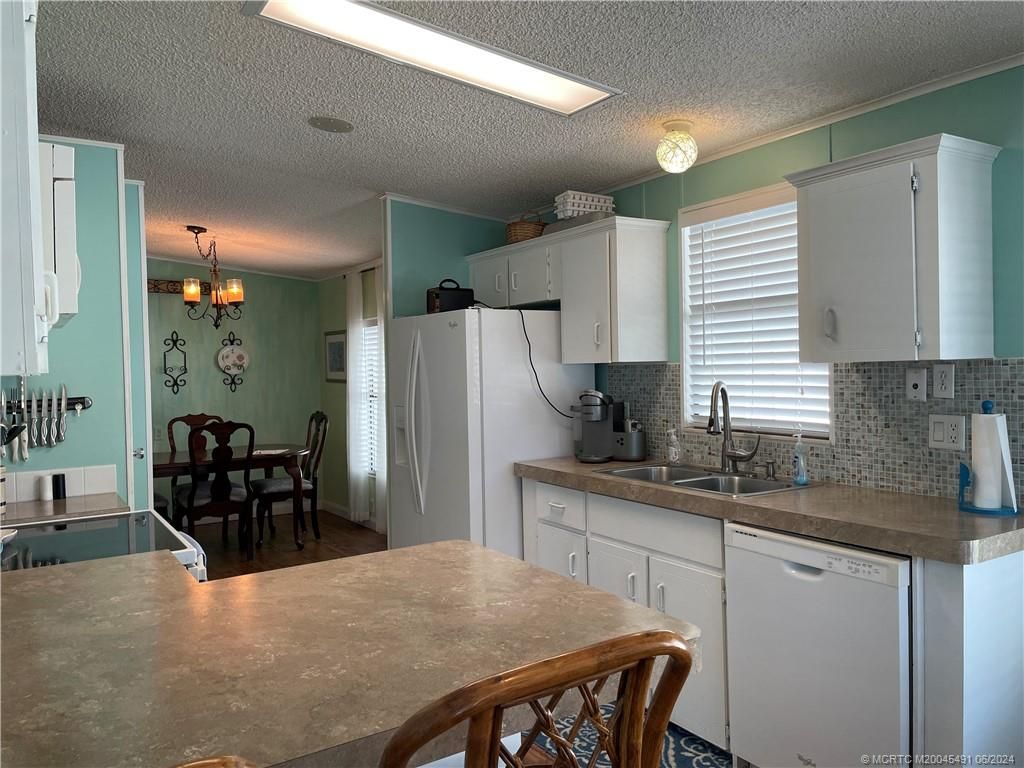 Photo of 14503 SW Rake Drive, Indiantown, FL 34956 (MLS # M20045491)