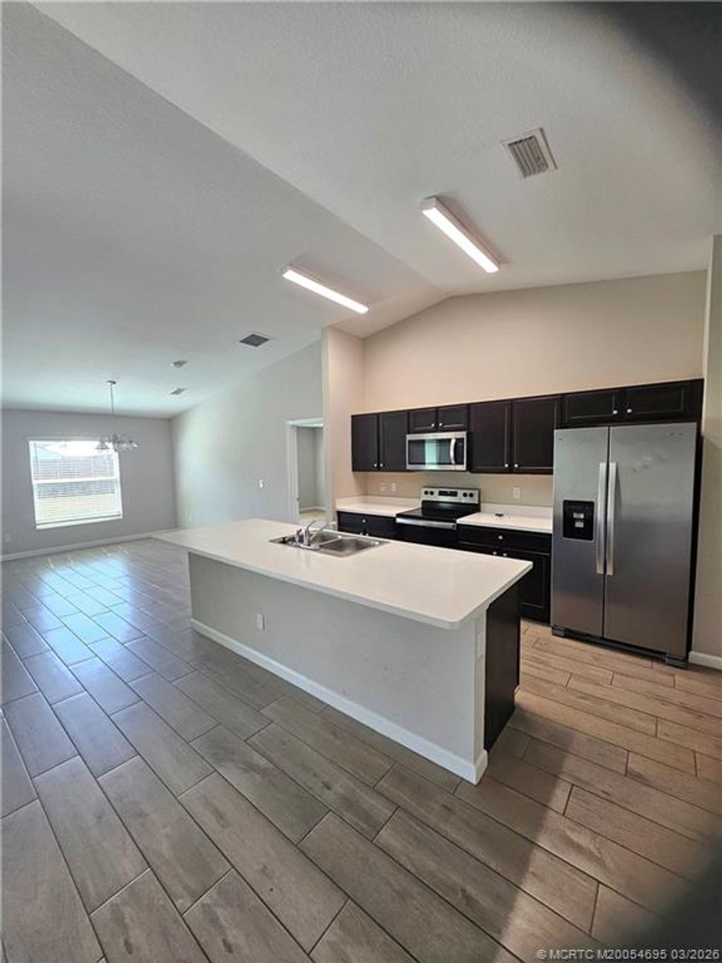 Photo of 1410 SW Flounder Lane, Port Saint Lucie, FL 34953 (MLS # M20054695)