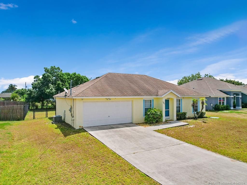 Photo of 141 NW Hibiscus Street, Port Saint Lucie, FL 34983 (MLS # M20044536)