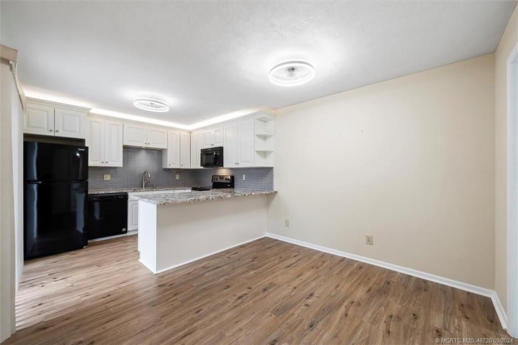 Photo of 6522 SE Windsong Lane #731, Stuart, FL 34997 (MLS # M20046720)