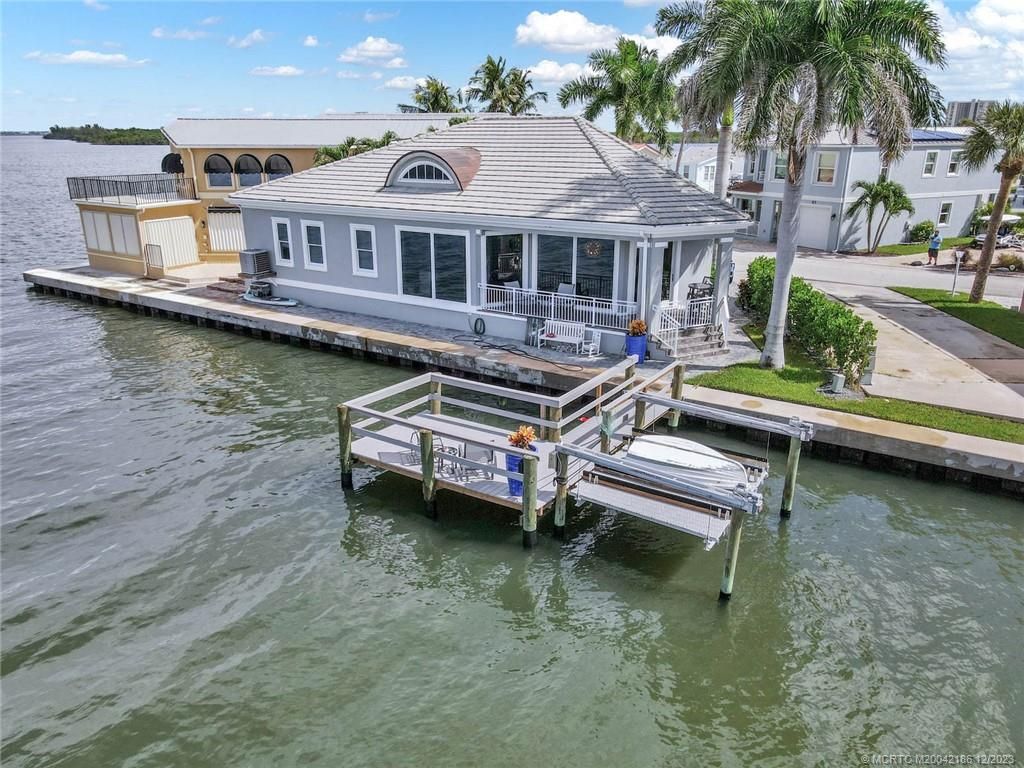 Photo of 58 Nettles Boulevard, Jensen Beach, FL 34957 (MLS # M20042186)