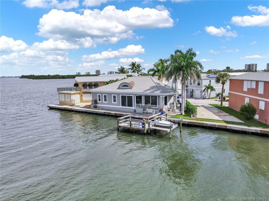 Photo of 58 Nettles Boulevard, Jensen Beach, FL 34957 (MLS # M20042186)