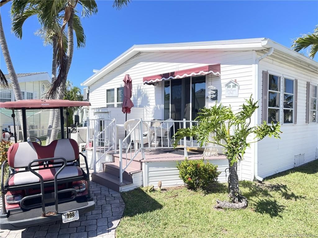 Photo of 998 Nettles Boulevard, Jensen Beach, FL 34957 (MLS # M20049725)