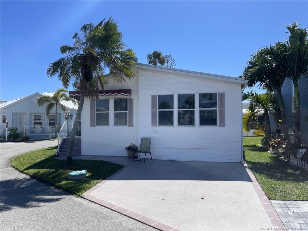 Photo of 998 Nettles Boulevard, Jensen Beach, FL 34957 (MLS # M20049725)