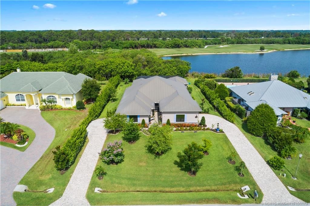 Photo of 10303 SW Rookery Way, Palm City, FL 34990 (MLS # M20040715)