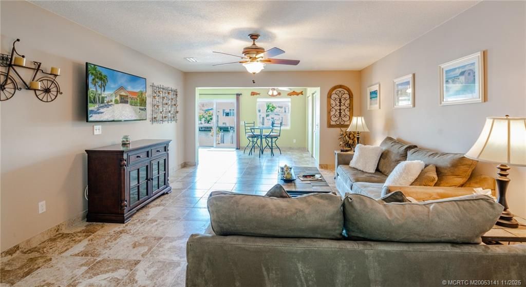 Photo of 60 Aqua Ra Drive, Jensen Beach, FL 34957 (MLS # M20053141)