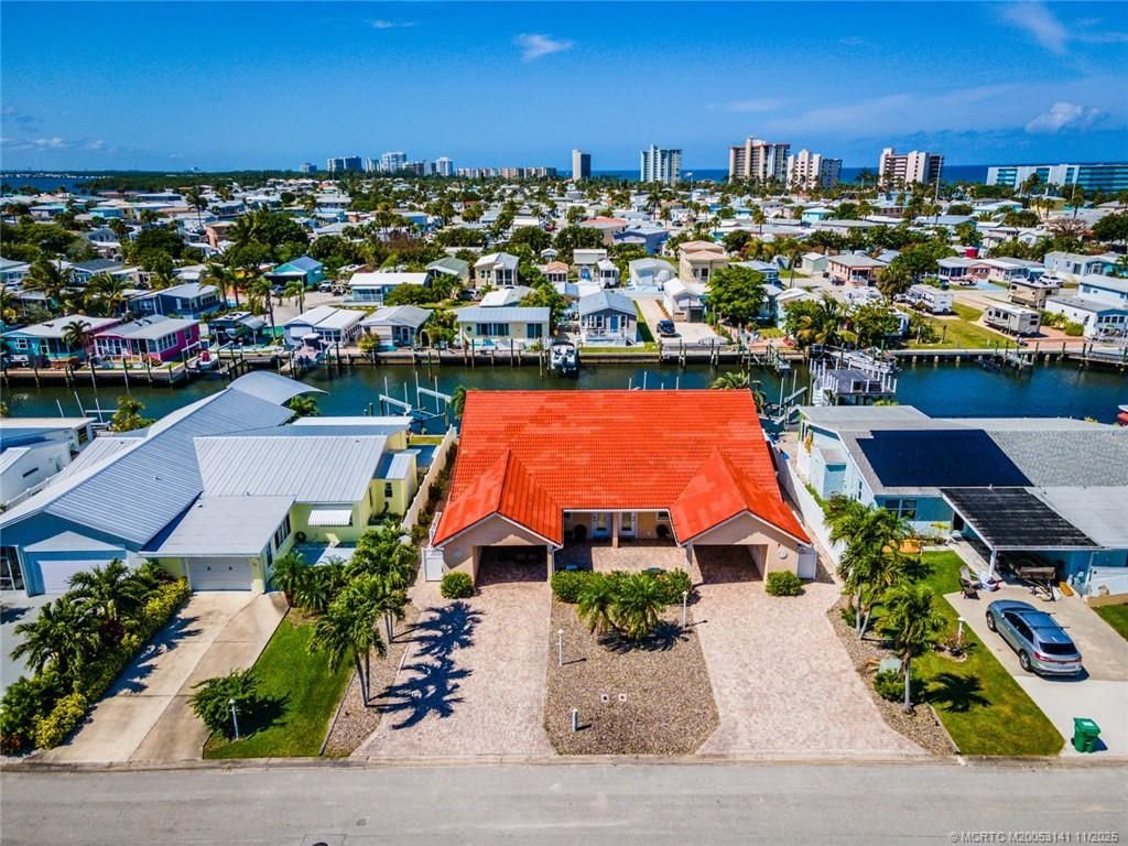 Photo of 60 Aqua Ra Drive, Jensen Beach, FL 34957 (MLS # M20053141)