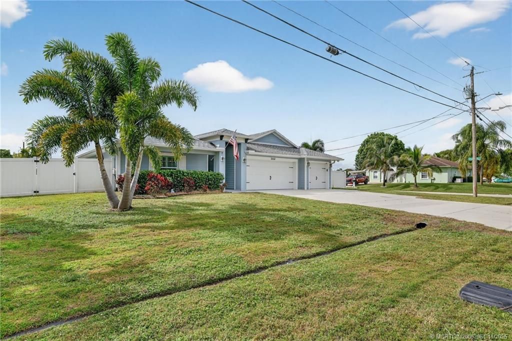Photo of 2502 SW Dalpina Road, Port Saint Lucie, FL 34953 (MLS # M20052951)