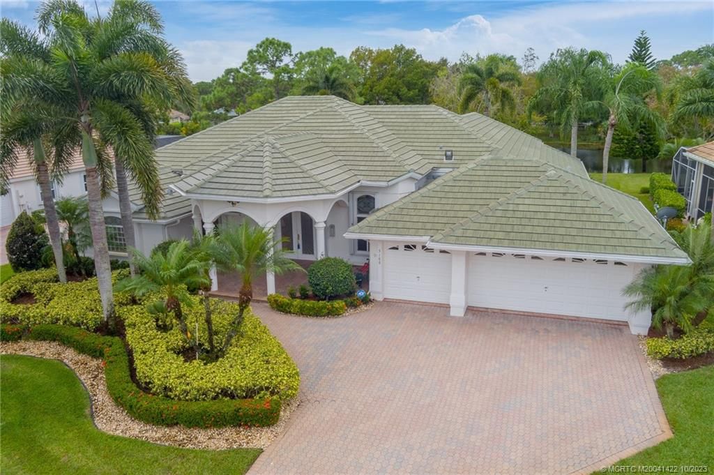 Photo of 5188 SW Hammock Creek Drive SW, Palm City, FL 34957 (MLS # M20041422)