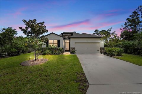 Photo of 6441 NW Regent Street, Port Saint Lucie, FL 34983 (MLS # M20052403)
