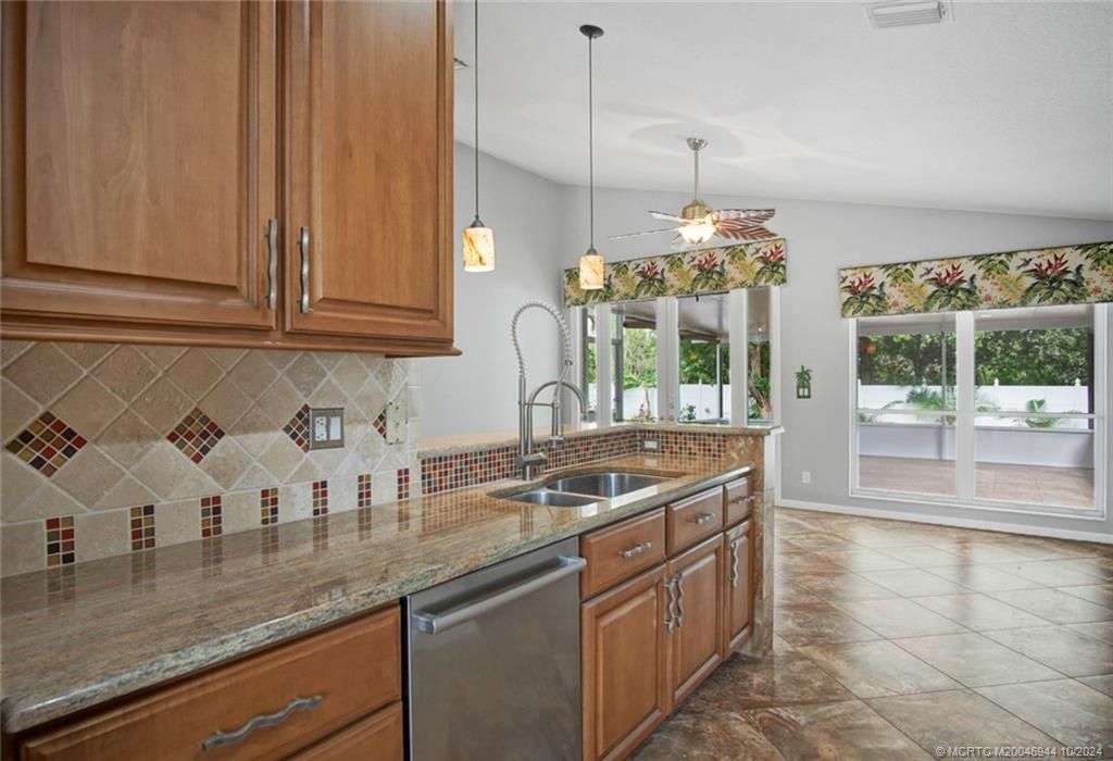 Photo of 896 NW Waterlily Place, Jensen Beach, FL 34957 (MLS # M20046944)