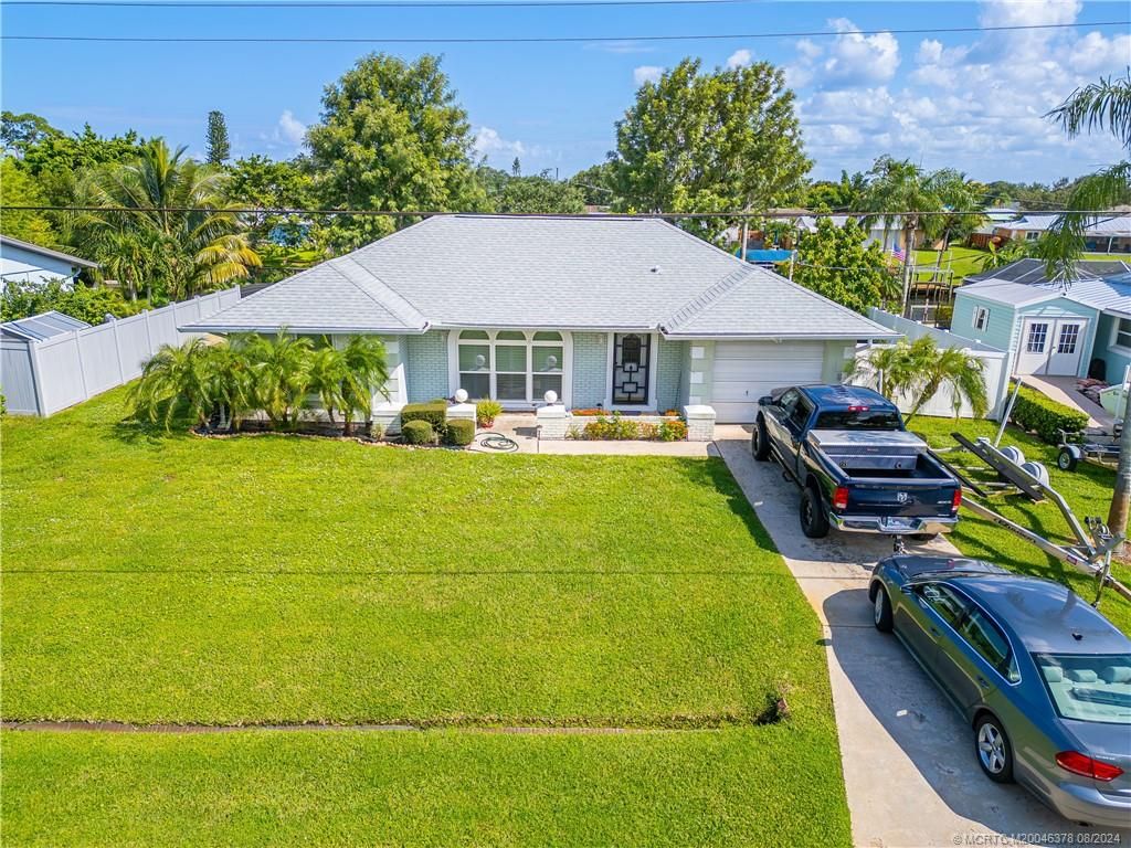 Photo of 727 SE Calmoso Drive, Port Saint Lucie, FL 34983 (MLS # M20046378)