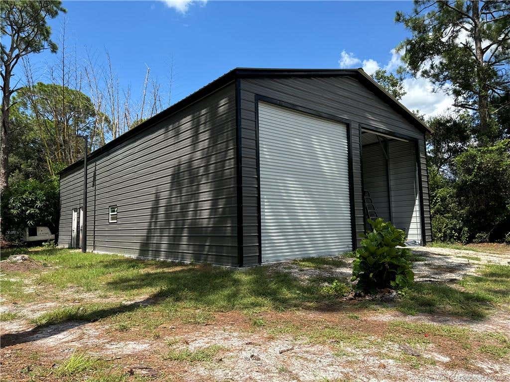 Photo of 1376 NE 144th Street, Okeechobee, FL 34972 (MLS # M20056661)