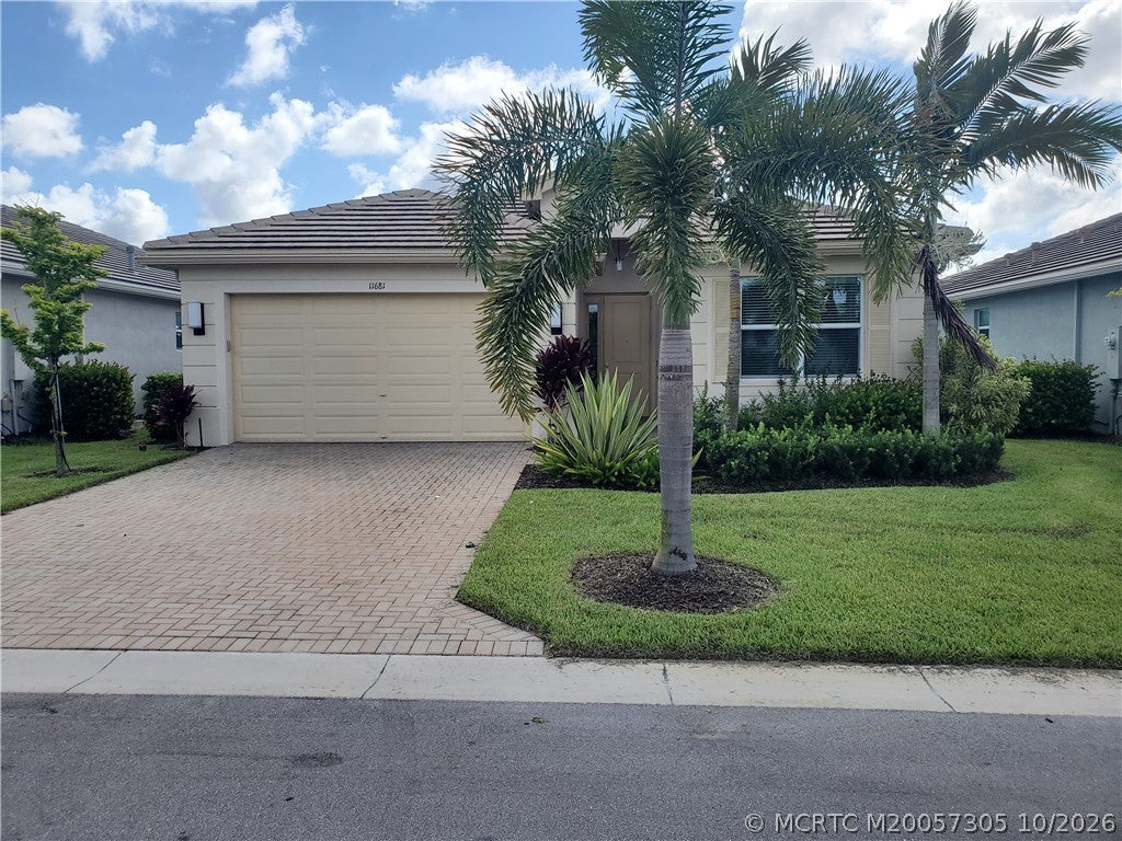 Photo of 11681 SW Oceanus Boulevard, Port Saint Lucie, FL 34987 (MLS # M20057305)
