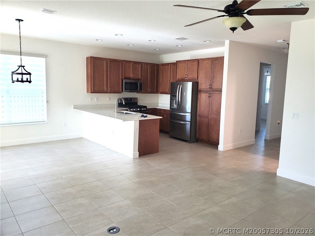 Photo of 11681 SW Oceanus Boulevard, Port Saint Lucie, FL 34987 (MLS # M20057305)