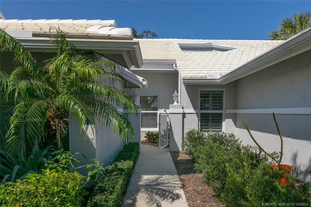 Photo of 2436 SW Foxpoint Trail, Palm City, FL 34990 (MLS # M20038107)