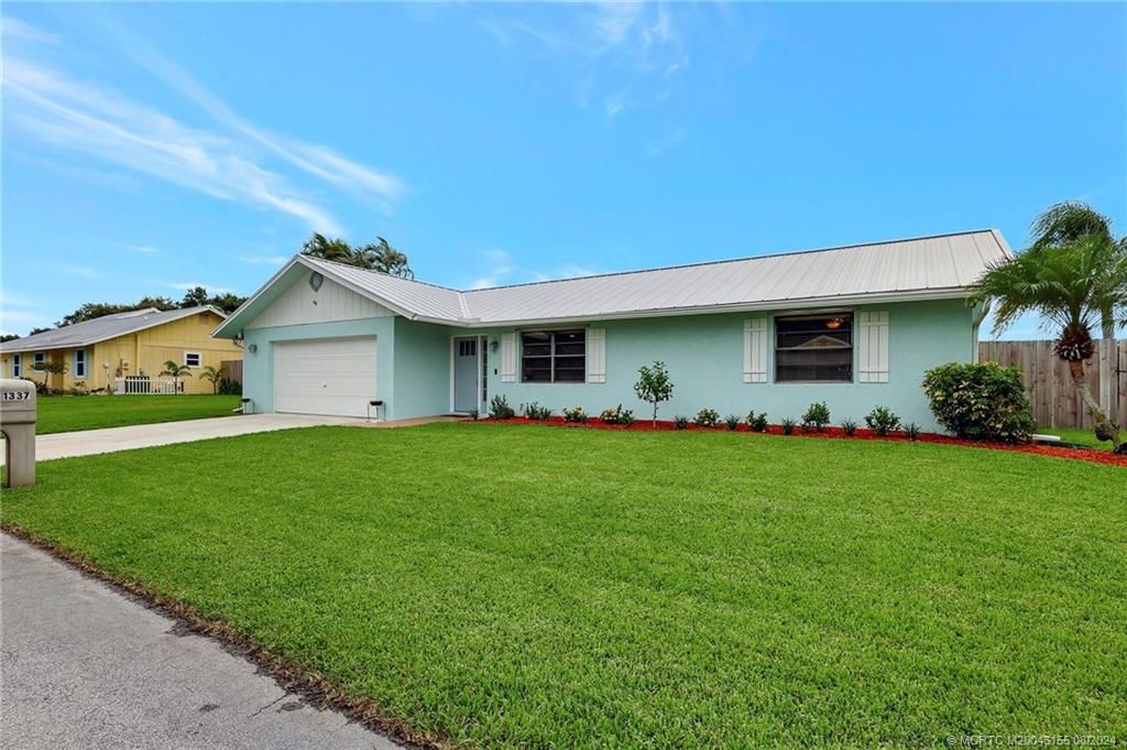 Photo of 1337 SW 24th Lane, Palm City, FL 34990 (MLS # M20046155)