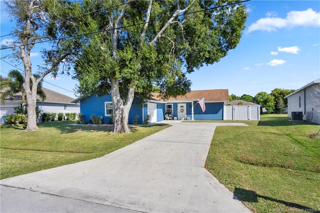 Photo of 2932 SE Buccaneer Circle, Port Saint Lucie, FL 34952 (MLS # M20052806)