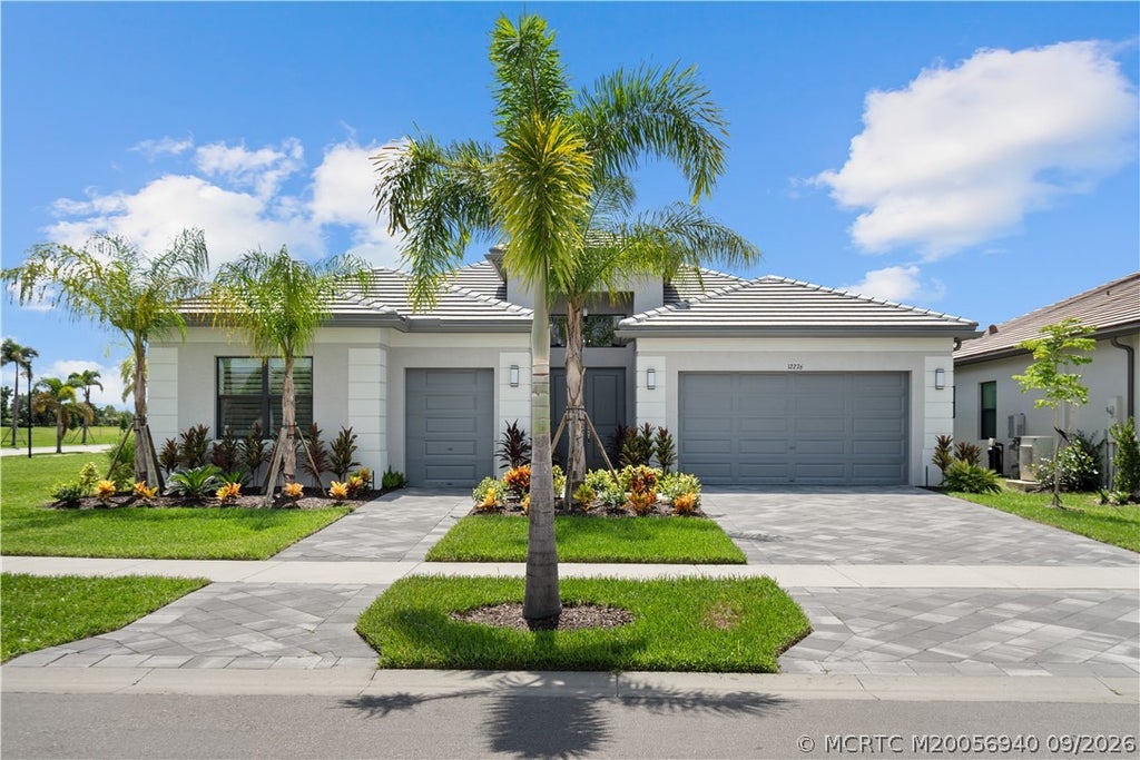 Photo of 12276 SW Willowy Way, Port Saint Lucie, FL 34987 (MLS # M20056940)