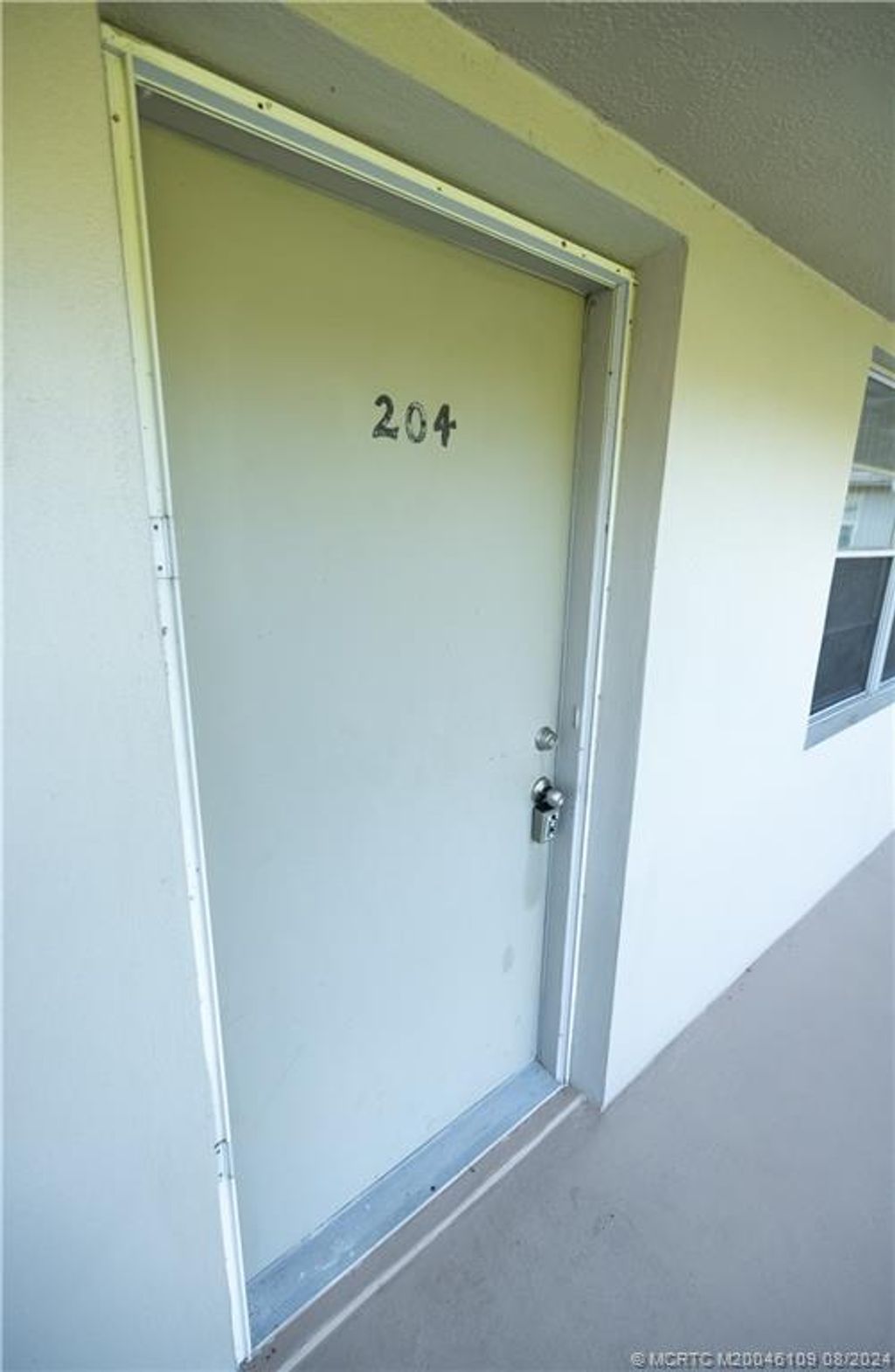 Photo of 2 Lake Vista Trail #204, Port Saint Lucie, FL 34952 (MLS # M20046109)