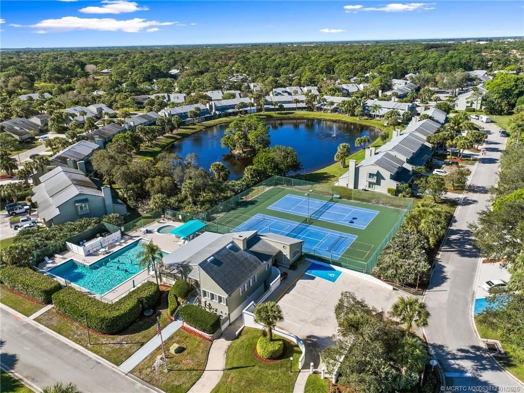 Photo of 890 NE Sandalwood Place, Jensen Beach, FL 34957 (MLS # M20053812)