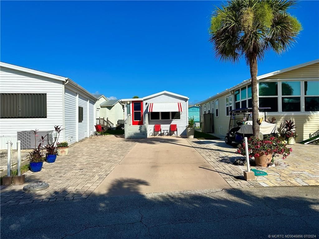 Photo of 1164 Nettles Boulevard, Jensen Beach, FL 34957 (MLS # M20045856)