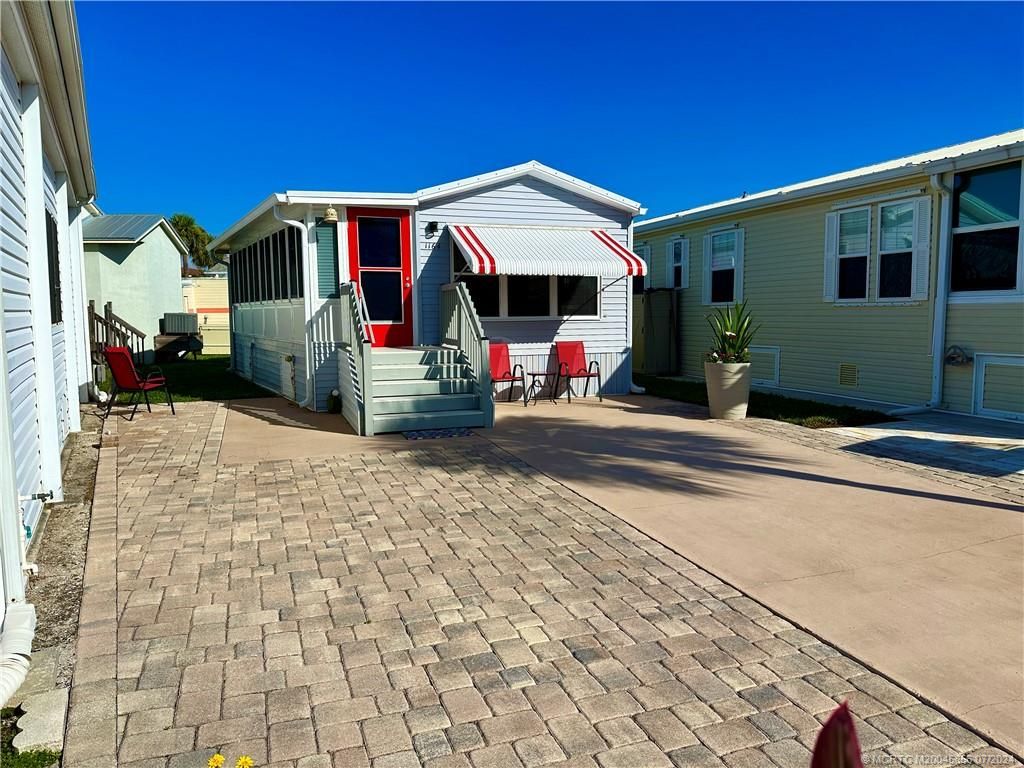 Photo of 1164 Nettles Boulevard, Jensen Beach, FL 34957 (MLS # M20045856)