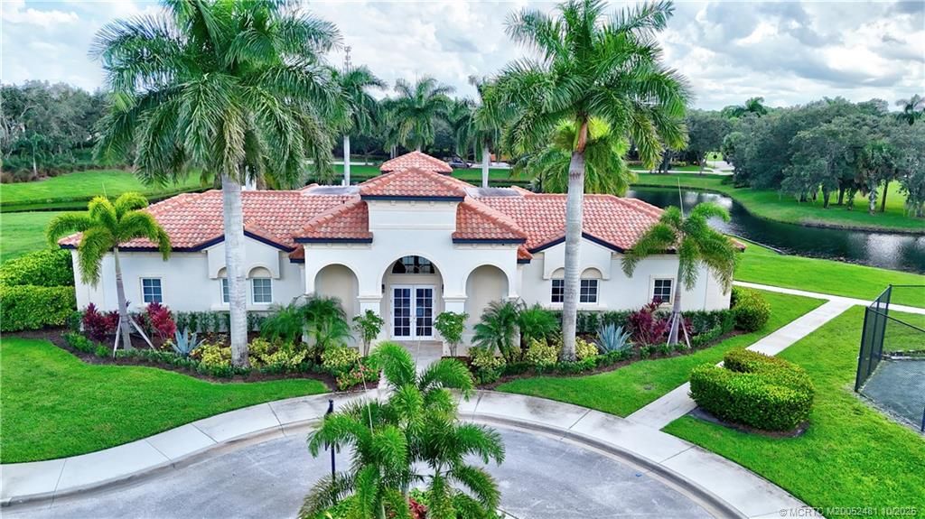 Photo of 300 SE Via Sangro, Port Saint Lucie, FL 34952 (MLS # M20052481)